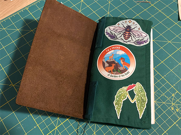 The pouch with stickers on the reverse side