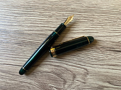 A shot of the pen showing off the green color in the light