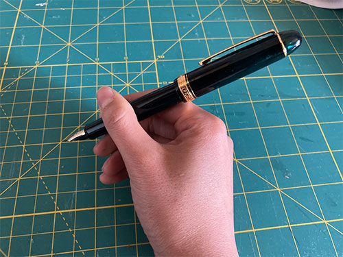 Holding the pen posted