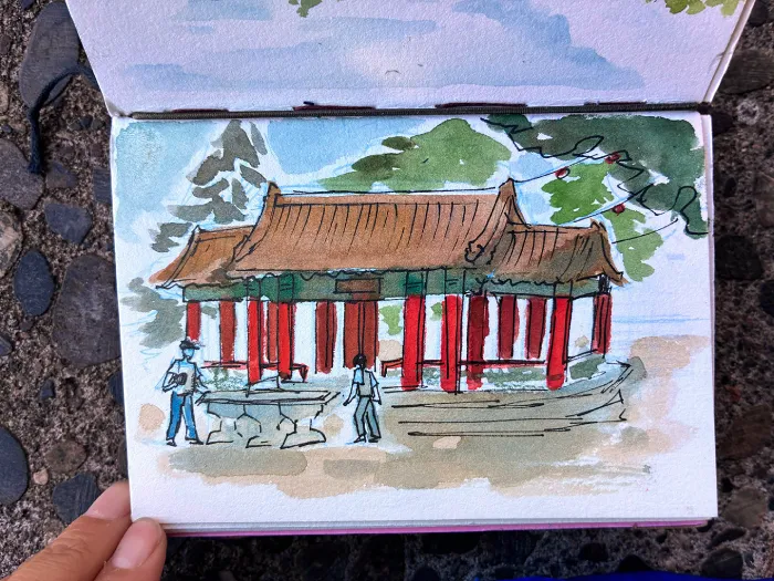 Watercolor painting of people playing ping pong in front of the Hing Hay pavillion