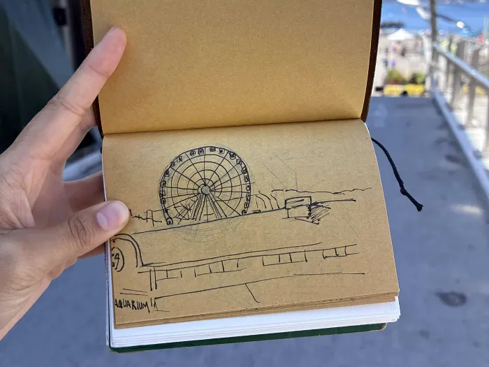 Drawing of the wheel with the aquarium in front of it