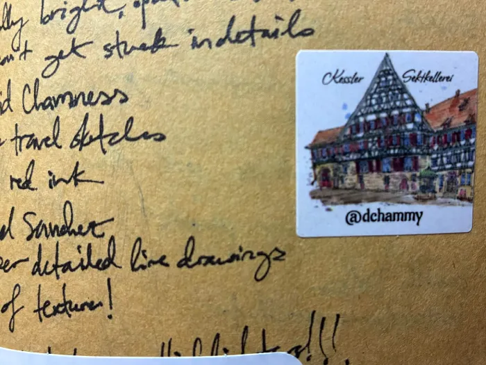 Photo of the sticker I got from David Chamness in my sketchbook